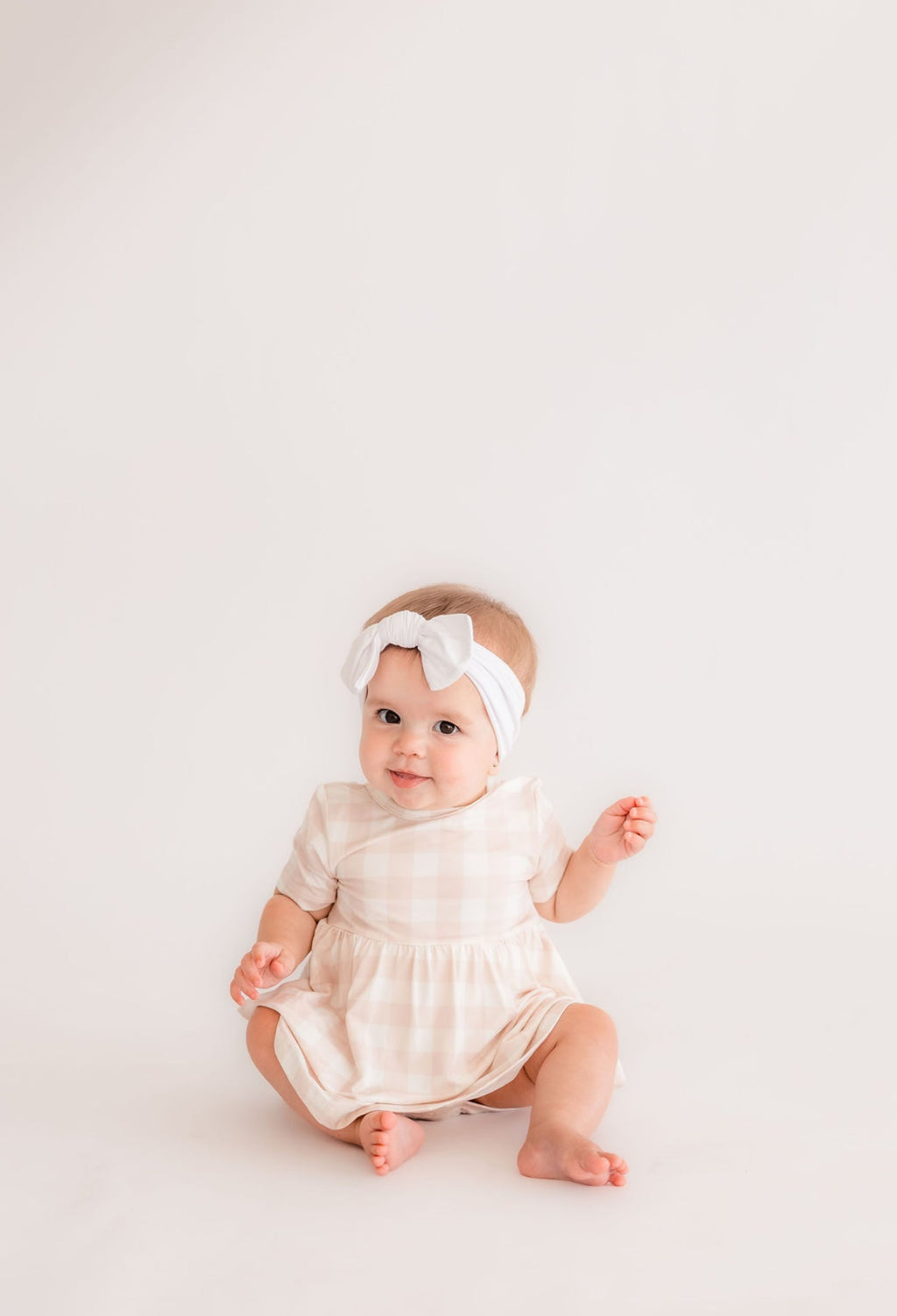 Neutral Gingham Twirl Bodysuit Romper